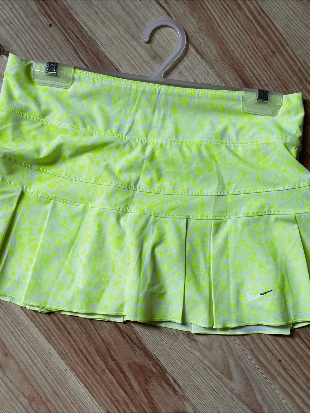 Nike. Neon skort with pleats.  Medium